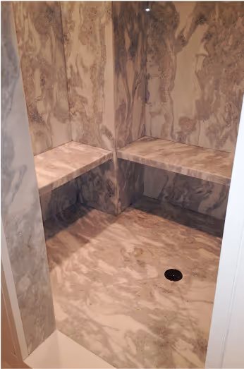 custom marmol sauna with custom stone seats